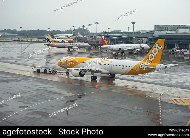 Singapore, Republic of Singapore, Asia - A Scoot Airlines Airbus A321neo passenger jet with the registration 9V-NCB during pushback at Changi International...