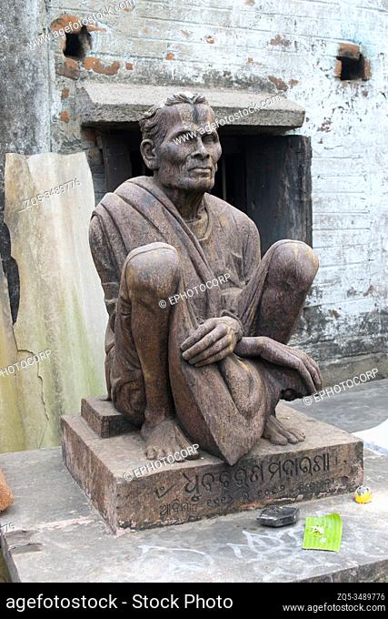 A sculpture of a typical Odiya man in the village of Udayagiri, Orissa