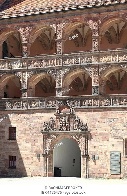 The Schoene Hof, Beautiful courtyard, Renaissance building with reliefs between the arcades, Hohenzollern residence Plassenburg castle, Kulmbach