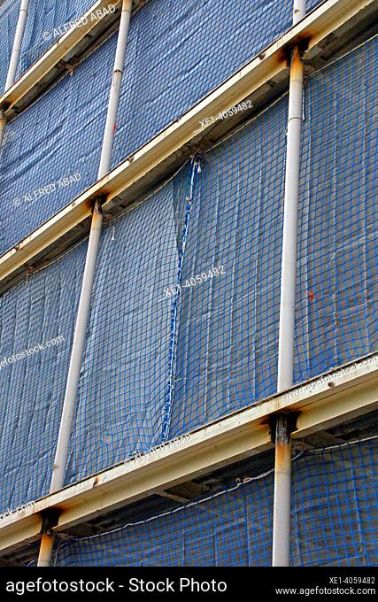 scaffolding in building under rehabilitation, Barcelona, Catalonia, Spain