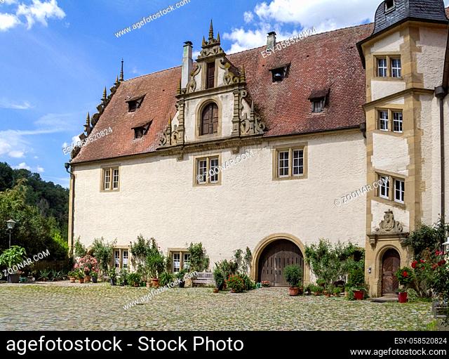 scenery around the Schoental Abbey located in Hohenlohe, a area in Southern Germany at summer time