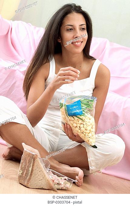WOMAN SNACKING Model
