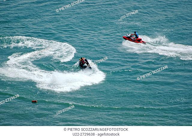 Lake Sevan, Armenia: tourists using jet-skis near the beach