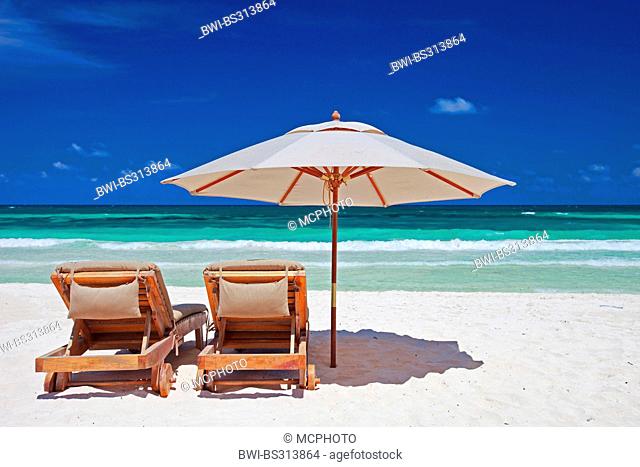 two canvas chairs and sunshade on stunning tropical beach, Mexico, Tulum