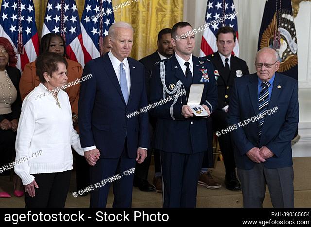 United States President Joe Biden presents the Presidential Citizens Medal posthumously to Gladys Sicknick and Charles Sicknick, mother and father of U