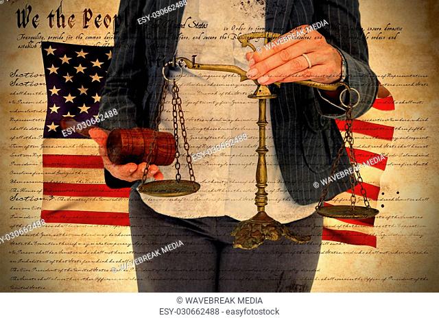 Composite image of female lawyer holding scale and gavel