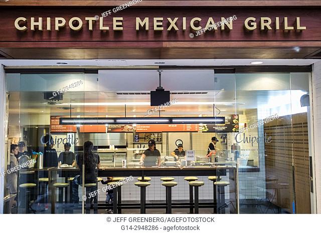 Washington DC, District of Columbia, Union Station, railroad, train, terminal, food court, Chipotle Mexican Grill, restaurant, casual dining, counter, woman