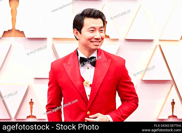 Simu Liu arrives on the red carpet of the 94th Oscars® at the Dolby Theatre at Ovation Hollywood in Los Angeles, CA, on Sunday, March 27, 2022