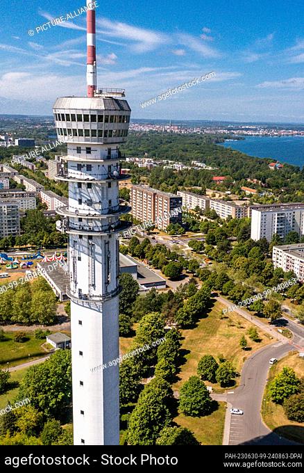 PRODUCTION - 30 May 2023, Mecklenburg-Western Pomerania, Schwerin: The TV tower in the Neu Zippendorf district, built between 1957 and 1964 and over 136 meters...