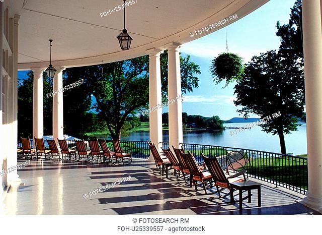 resort, rocking chairs, Cooperstown, New York, Rocking chairs on the porch of The Otesaga Resort Hotel overlooking Otsego Lake in Cooperstown, NY