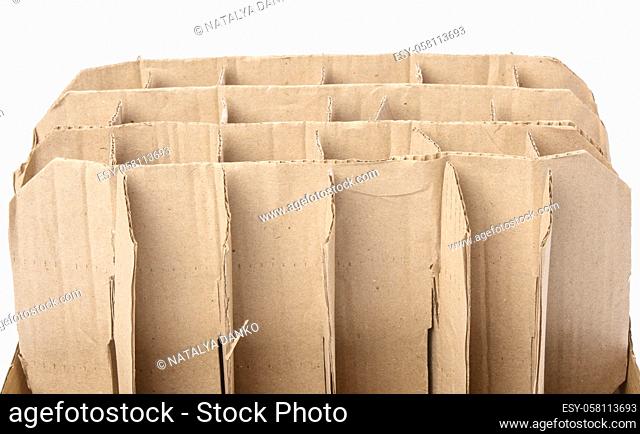 brown corrugated paper cardboard box with partitions, glass bottle transport box isolated on white background, close up