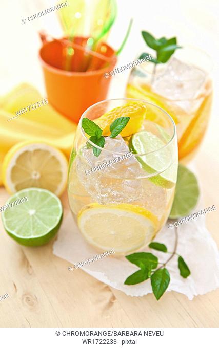 Fresh homemade lemonade with citrus fruits