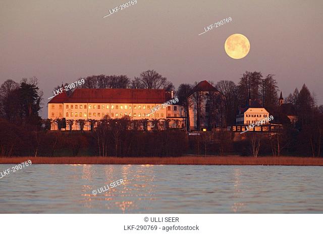 Rising moon over the old palace of Herrenchiemsee, Herreninsel, Lake Chiemsee, Chiemgau, Bavaria, Germany