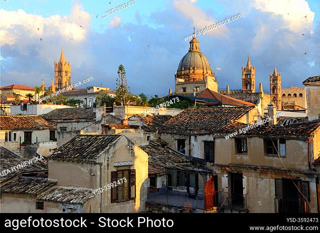 In foreground architecture of old town of Palermo, In background towers and Cupola of Roman Catholic Archdiocese of Palermo