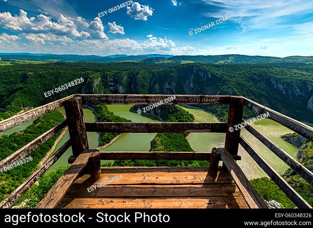 Viewpoint of meanders at rocky river Uvac gorge on sunny day, southwest Serbia