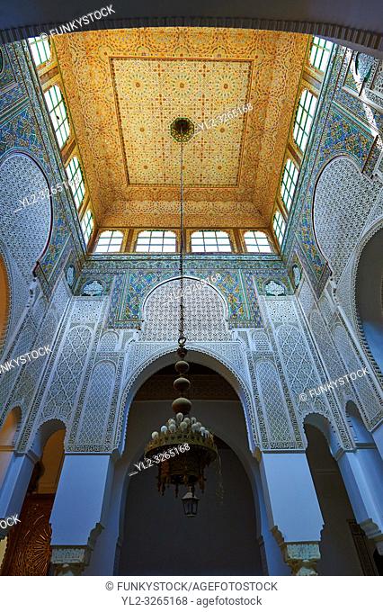 Inner fountain courtyard with Berber Mocarabe Honeycomb work plaster decorations and Berber design tiles of the Mauseleum of Moulay Ismaïl Ibn Sharif