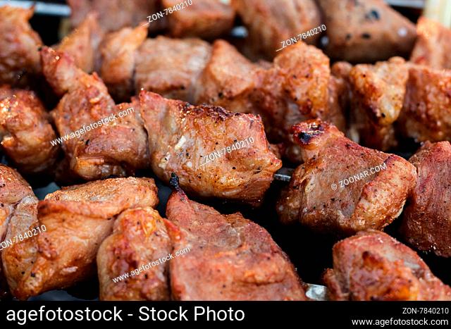shashlik. traditional meal. meat roasted on skewers