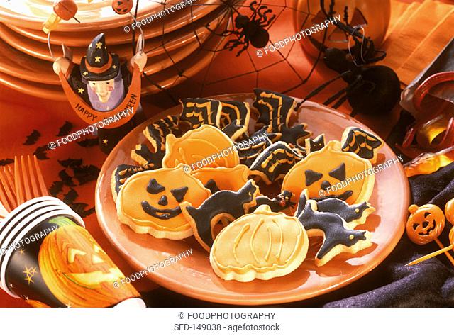 Plate of Halloween biscuits, Halloween decoration beside it