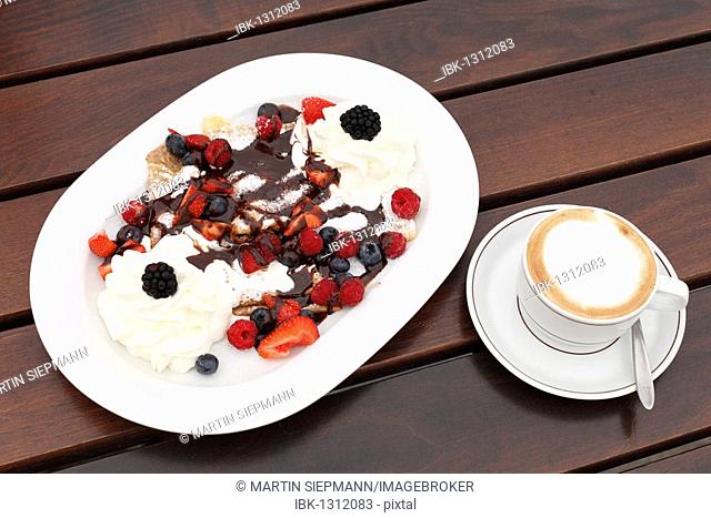 Pancakes with berries and cream, cappuccino, Burgenland, Austria, Europe