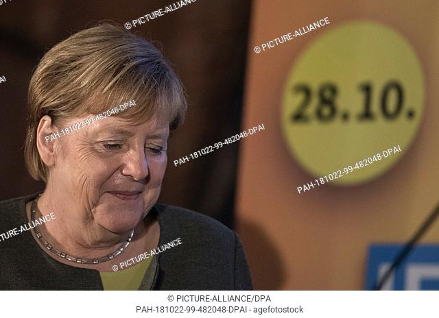22 October 2018, Hessen, Ortenberg: Chancellor Angela Merkel (CDU) comes on stage in the marquee on the Cold Market. A new state parliament will be elected in...