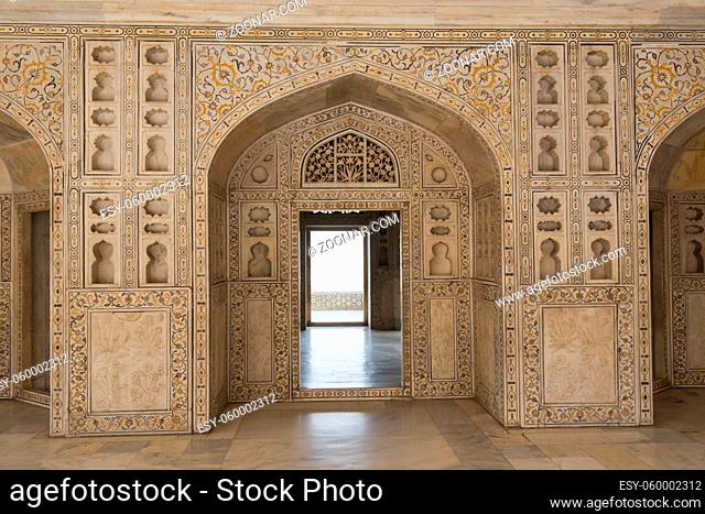 Arches at the Agra Fort, magnificent fortified palace in India. This maharajah residence is an Unesco world heritage site