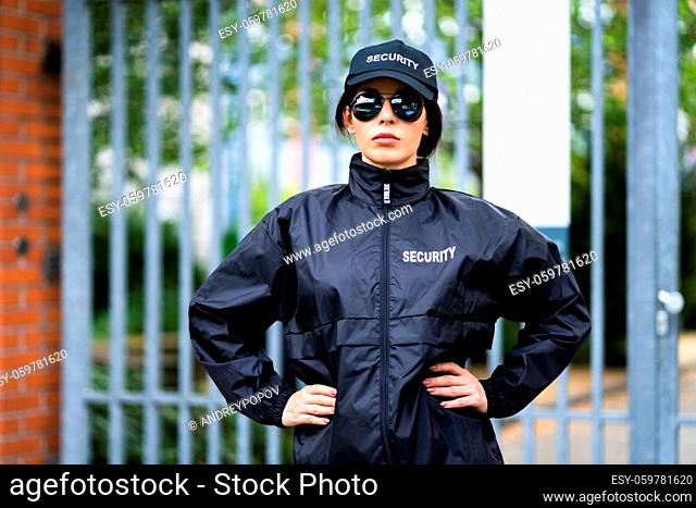 Security Guard Officer In Uniform. Guard Service Woman Standing