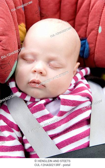 baby sleeping in car seat