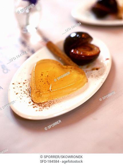 White wine and cinnamon jelly and plums fried in butter