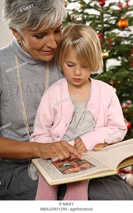 Grandmother, granddaughter, christmas-history, reading, semi-portrait, broached