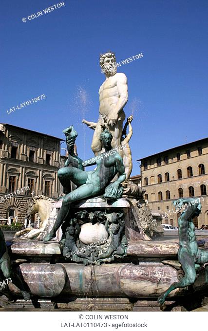 Piazza Della Signoria. Neptune Fountain. Sculpture. Male and female figures. Horse. Buildings behind. Square