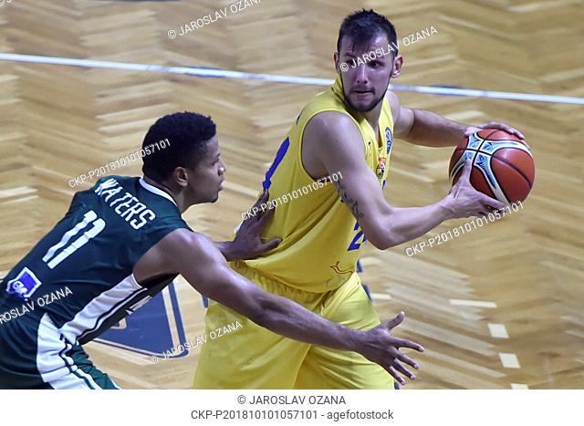 L-R Dominic Waters (Nanterre) and Jakub Sirina (Opava) in action during the Men's Basketball Champions League group B first round game Opava vs Nanterre in...