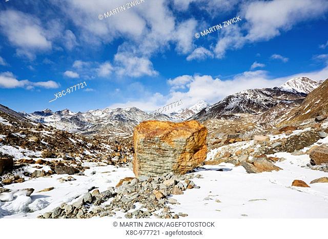 Glacier foreland of Ghiacciaio Dei Forni with just exposed moraine debris, which is exposed as the glacier is retreating melting rapidly  Mount Koenigsspitze...