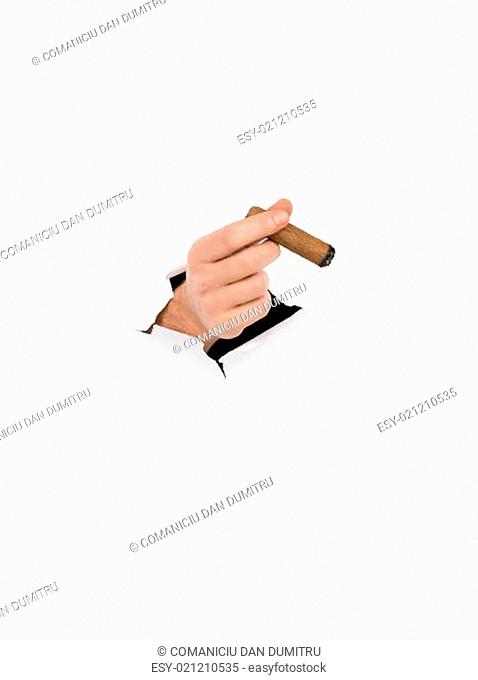 male hand holding cigar