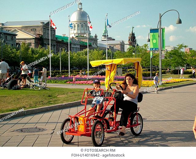 Montreal, Canada, QC, Quebec, Old Port, Old Montreal, Bonsecours Market (Marche Bonsecours), waterfront, riverwalk, side by side two seated bicycle with surrey...