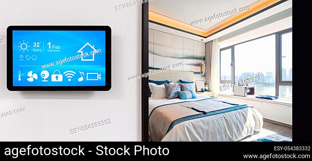 smart home system on intelligence screen on wall and background of modern bedroom