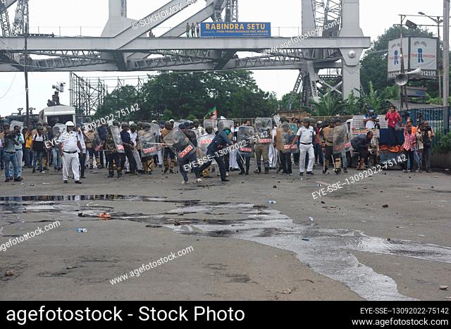 September 13, 2022, Kolkata, India: Integrants of the Bharatiya Janata Party take part during a protest. BJP Demonstrators confront Police Personals and also...