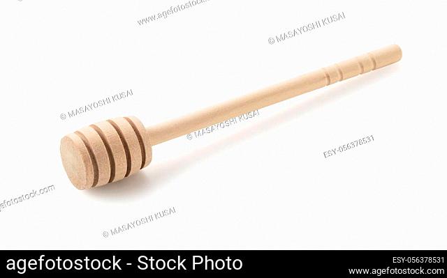 Honey dipper on a white background