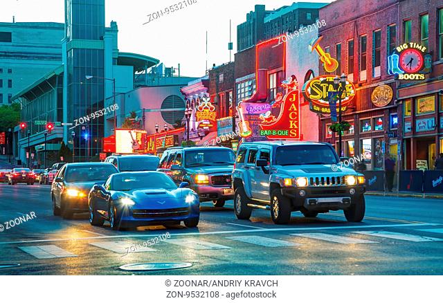 NASHVILLE - AUGUST 28: Downtown Nashville with people in the evening on August 28, 2015 in Nashville, TN. Nashville is the capital of the State of Tennessee and...