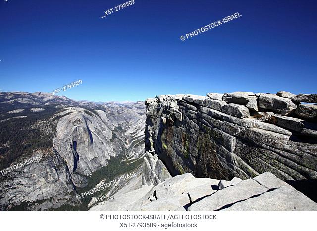 Climbing Half Dome rock at Yosemite national Park, California USA