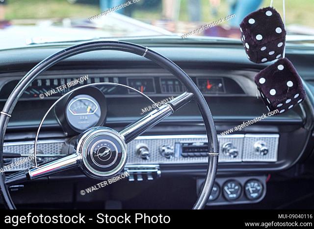 USA, New England, Massachusetts, Cape Ann, Gloucester, antique car, antique car steering wheel and fuzzy dice
