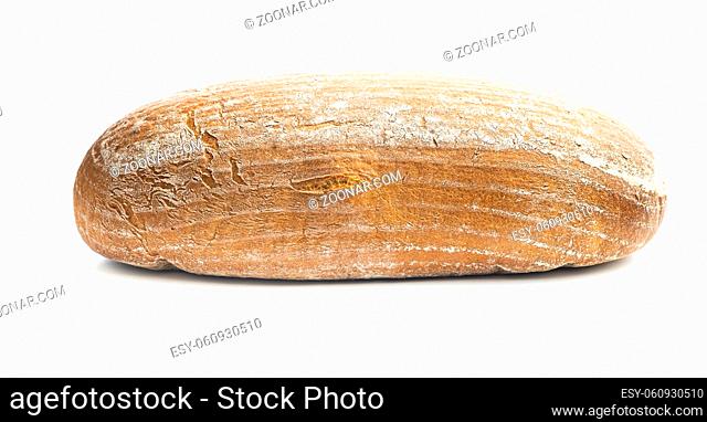 Loaf of baked bread isolated on white background