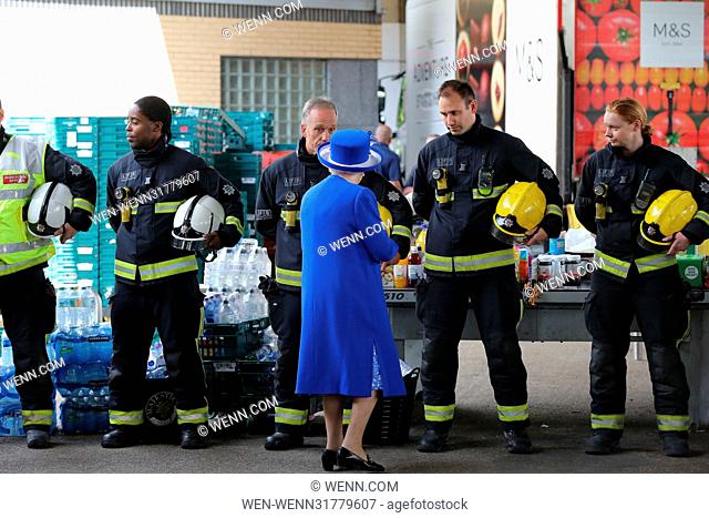 Queen Elizabeth II and Prince William, Duke of Cambridge during a visit to the Westway Sports Centre which is providing temporary shelter for those who have...
