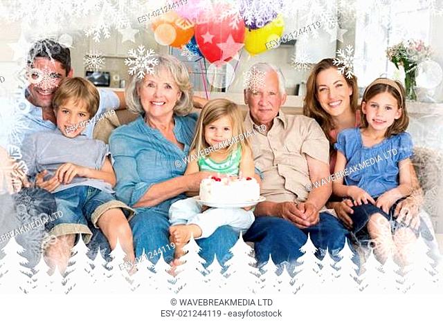 Composite image of multigeneration family celebrating girls birthday