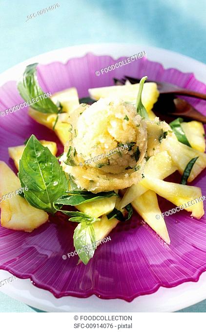Plated pineapple-melon sorbet with fresh fruit