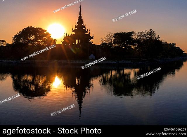 Pagoda silhouette during a sunset in Mandalay, Myanmar (Burma)