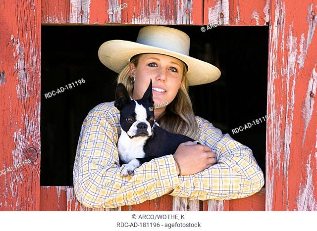 Cowgirl with French Bulldog, western outfit, Ponderosa Ranch, Oregon, USA, Wild West