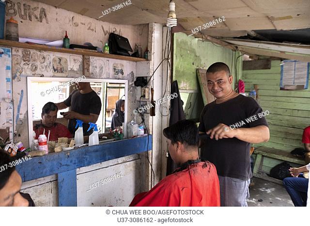 Barber in Pemangkat, West Kalimantan, Indonesia