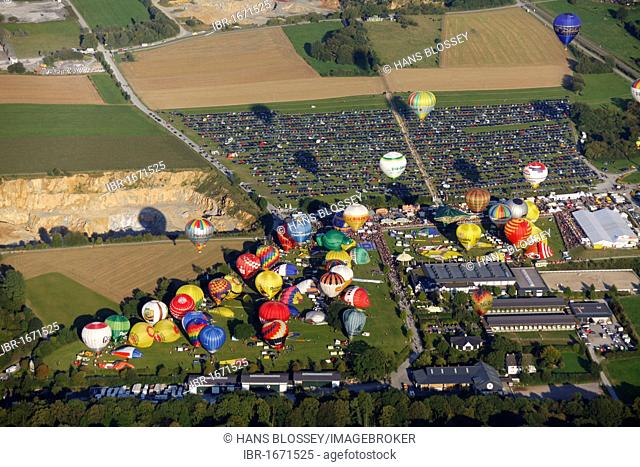 Aerial view, 20th Warsteiner Montgolfiade, hot air balloon festival with nearly 200 hot air balloons ascending into the sky, Warstein, Sauerland