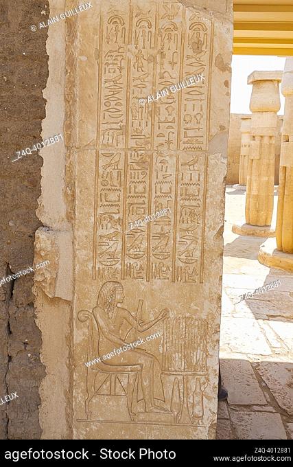 Egypt, Saqqara, tomb of Horemheb, statue room, hieroglyphic text on door jamb and Horemheb representation