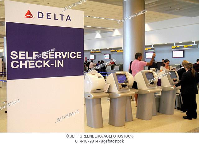 Florida, Miami, Miami International Airport, MIA, terminal, ticket counter, passengers, Delta Airlines, self service check-in, kiosk